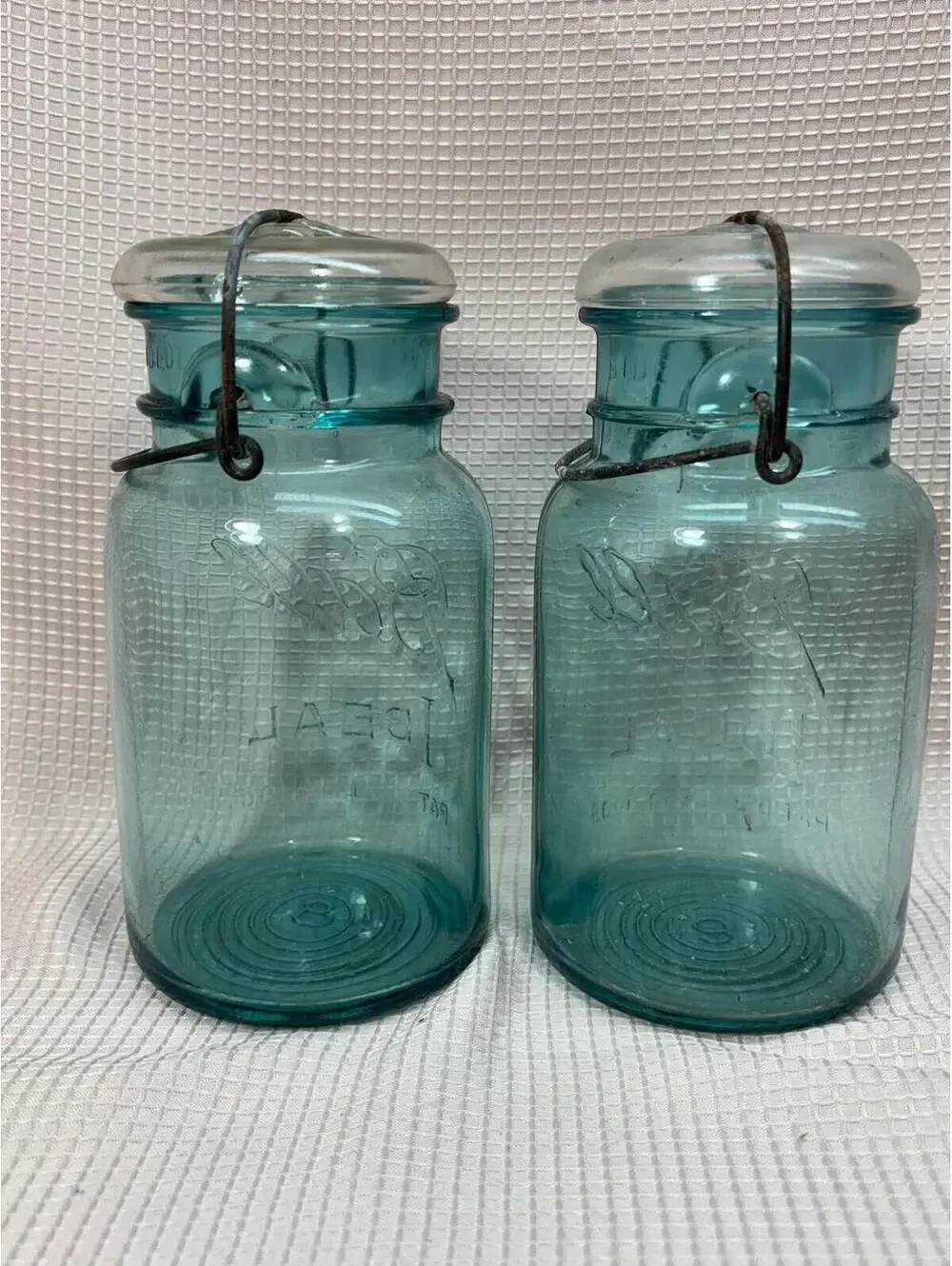 62 - 2 vintage round Blue canning jars wire lock glass lids -  Ball